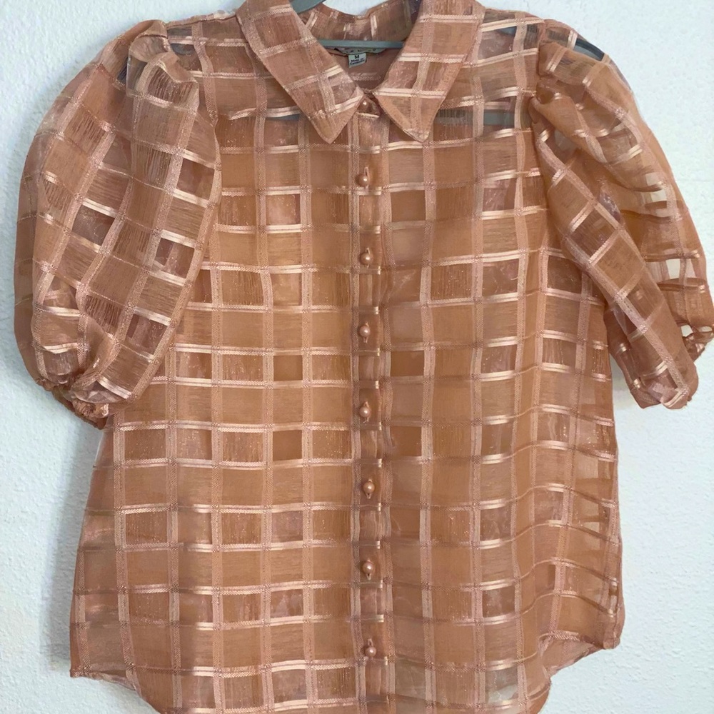 •New •i bought this blouse but it was never used